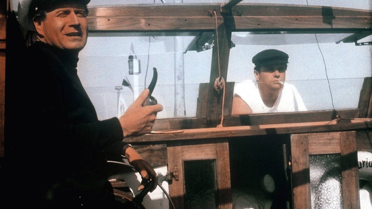 drei mann in einem boot