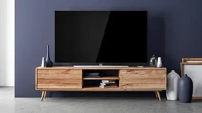 Fernseher mit integriertem Sat Receiver kaufen Vergleich - Foto: iStock/Customdesigner