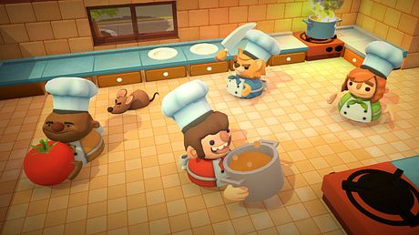 Vier Figuren aus Overcooked in einer Küche. Sie tragen Töpfe, Messer und Kochzutaten. - Foto: Ghost Town Games/PR