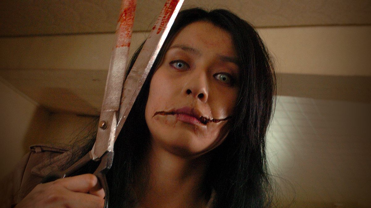 Carved - The Slit Mouthed Woman Carved - The Slit Mouthed Woman