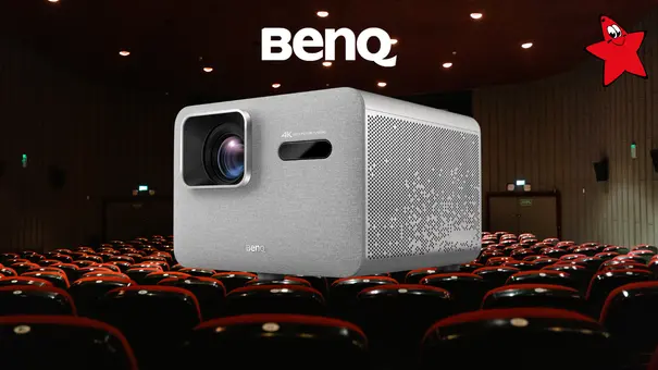BenQ TK705i vor Kinoleinwand und Kinositzen - Foto: TV Movie BenQ TK705i vor Kinoleinwand und Kinositzen - Foto: TV Movie