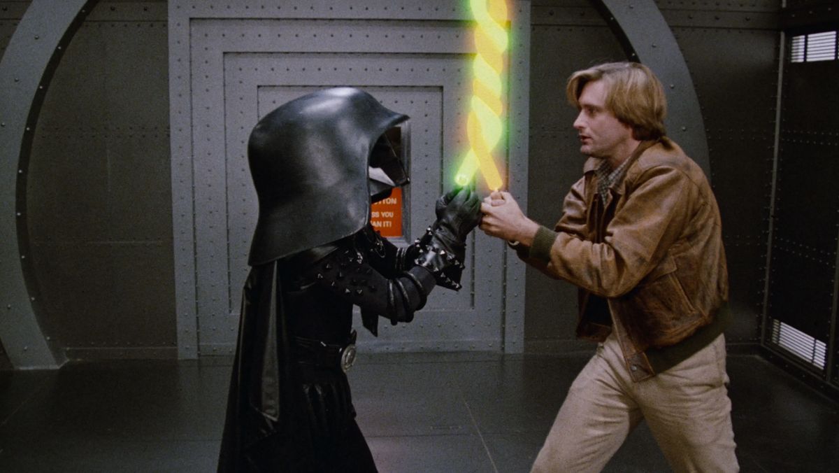 Den feinen Witz sucht man in „Spaceballs“ vergeblich. Lord Helmchen und Lone Starr kämpfen mit Lichtschwertern, die sich jedoch verknotet haben.