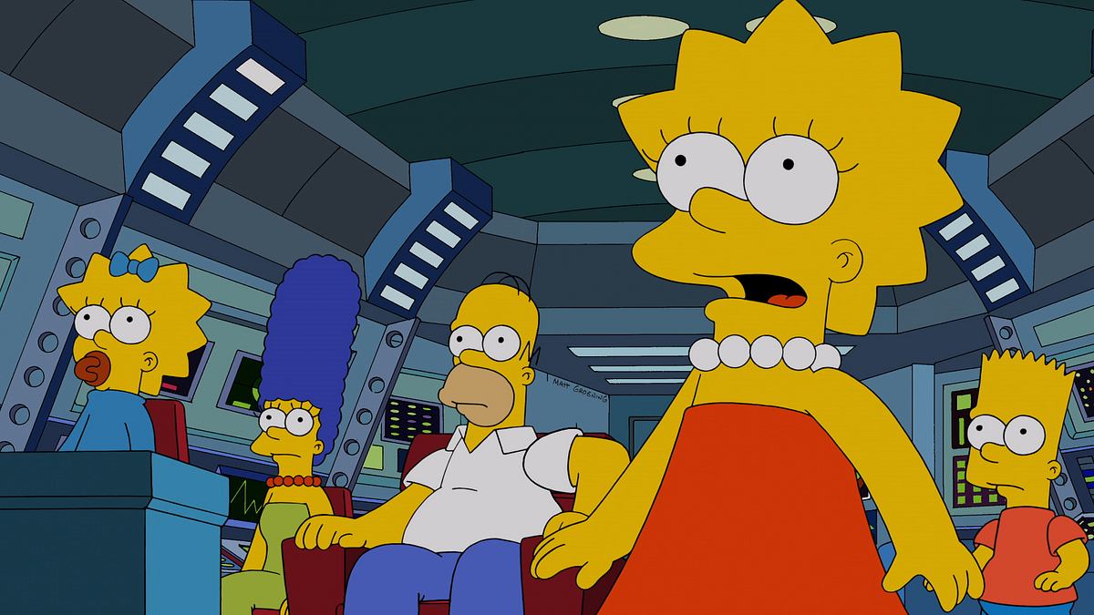 Die Simpsons Man sieht von links nach rechts Maggie, Marge, Homer, Lisa und Bart Simpson. Sie sind in einem Objekt, das einem Raumschiff ähnlich sieht und haben alle besorgte Gesichter.