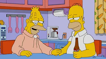 Homer und sein Vater schauen sich liebevoll an und halten Hände - Foto: IMAGO / Everett Collection