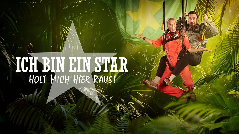 Dschungelcamp 2026 Teaser-Bild mit Sonja Zietlow und Jan Köppen, die von einem Bildschirm runterhängen.