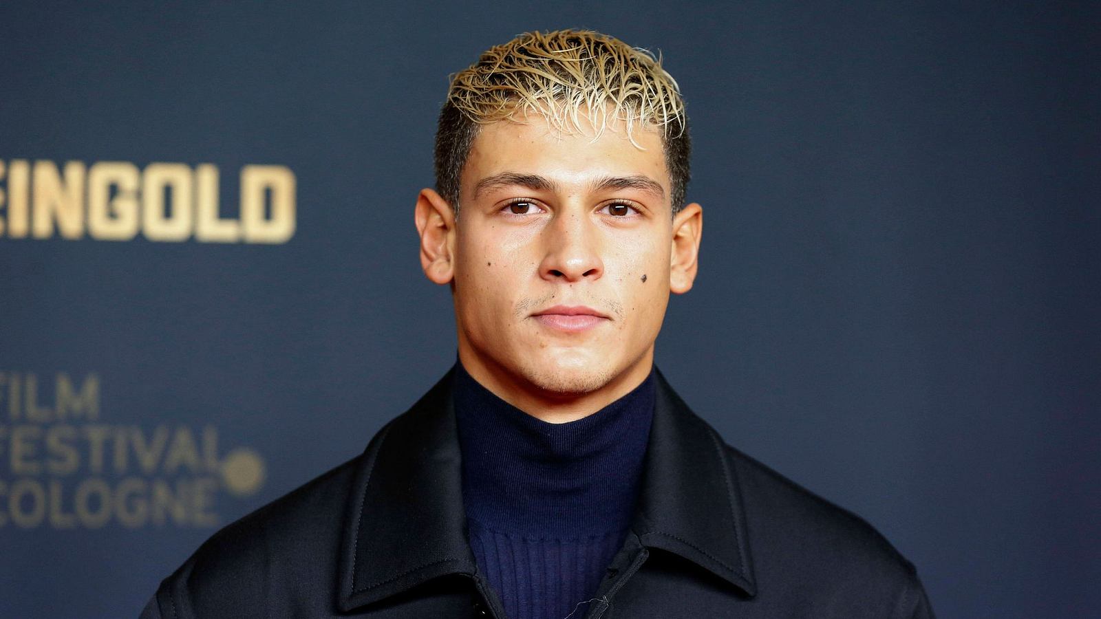 Emilio Sakraya at a film event Emilio Sakraya at a film event, pictured in a dark jacket and navy turtleneck
