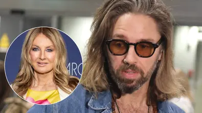 Gil Ofarim mit schulterlangem Haar, Bart, getönter Brille und Nasenring, der nach unten blickt. Links oben ist ein rundes eingeblendetes Porträt von Frauke Ludowig mit langen Wellen vor einem blauen Hintergrund zu sehen. - Foto: IMAGO / BREUEL-BILD / Matthias Wehnert 