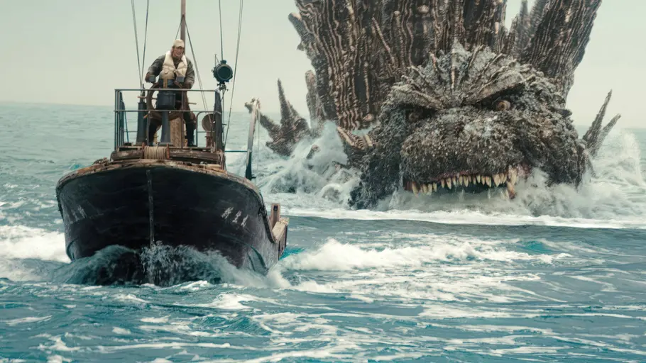 Godzilla verfolgt ein Schiff auf dem Wasser. - Foto: IMAGO / Everett Collection Godzilla verfolgt ein Schiff auf dem Wasser. - Foto: IMAGO / Everett Collection
