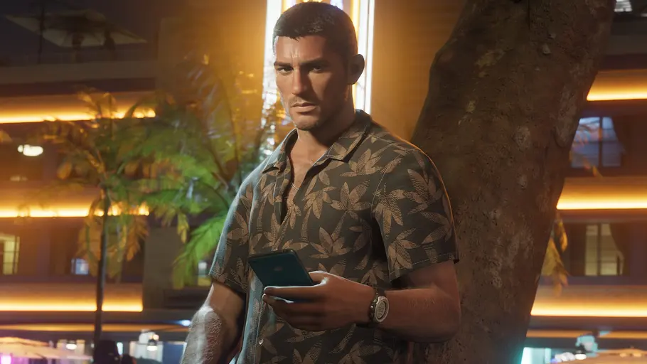 GTA 6 Jason Jason Duval bei GTA 6 steht an einem Baum und spielt am Smartphone