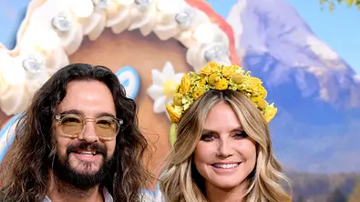 Heidi Klum und Tom Kaulitz in Tracht mit dem Hund auf dem Arm. - Foto: IMAGO / Frederick Keiller Heidi Klum und Tom Kaulitz in Tracht mit dem Hund auf dem Arm. - Foto: IMAGO / Frederick Keiller