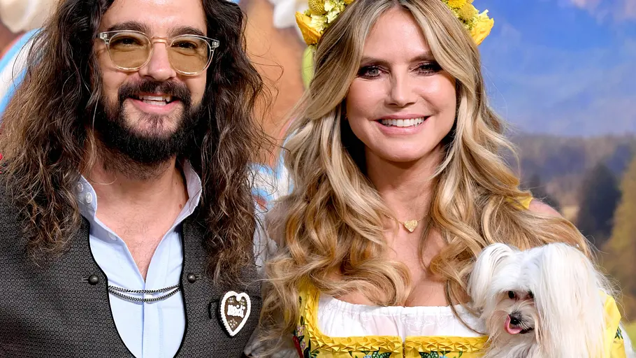 Heidi Klum kam mit Tom Kaulitz und Hund Fritz. Heidi Klum und Tom Kaulitz in Tracht mit dem Hund auf dem Arm.