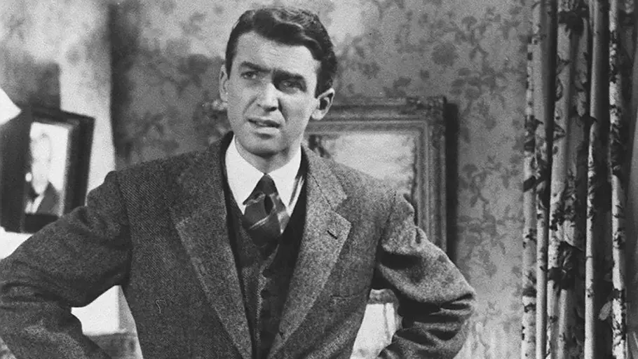 James Stewart mit Armen in die Seite gestützt