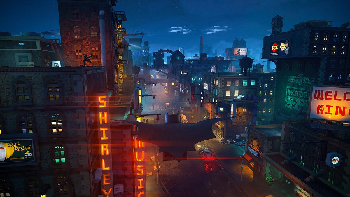 Batman gleitet durch Gotham City mit vielen Neon-Lichtern im Blick in Lego Batman: Legacy of the Dark Knight