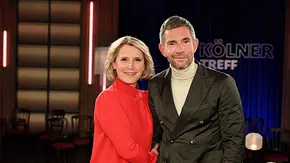 Susan Link und Micky Beisenherz stehen lächelnd im Studio des „Kölner Treff“. - Foto: IMAGO / Horst Galuschka Susan Link und Micky Beisenherz stehen lächelnd im Studio des „Kölner Treff“. - Foto: IMAGO / Horst Galuschka