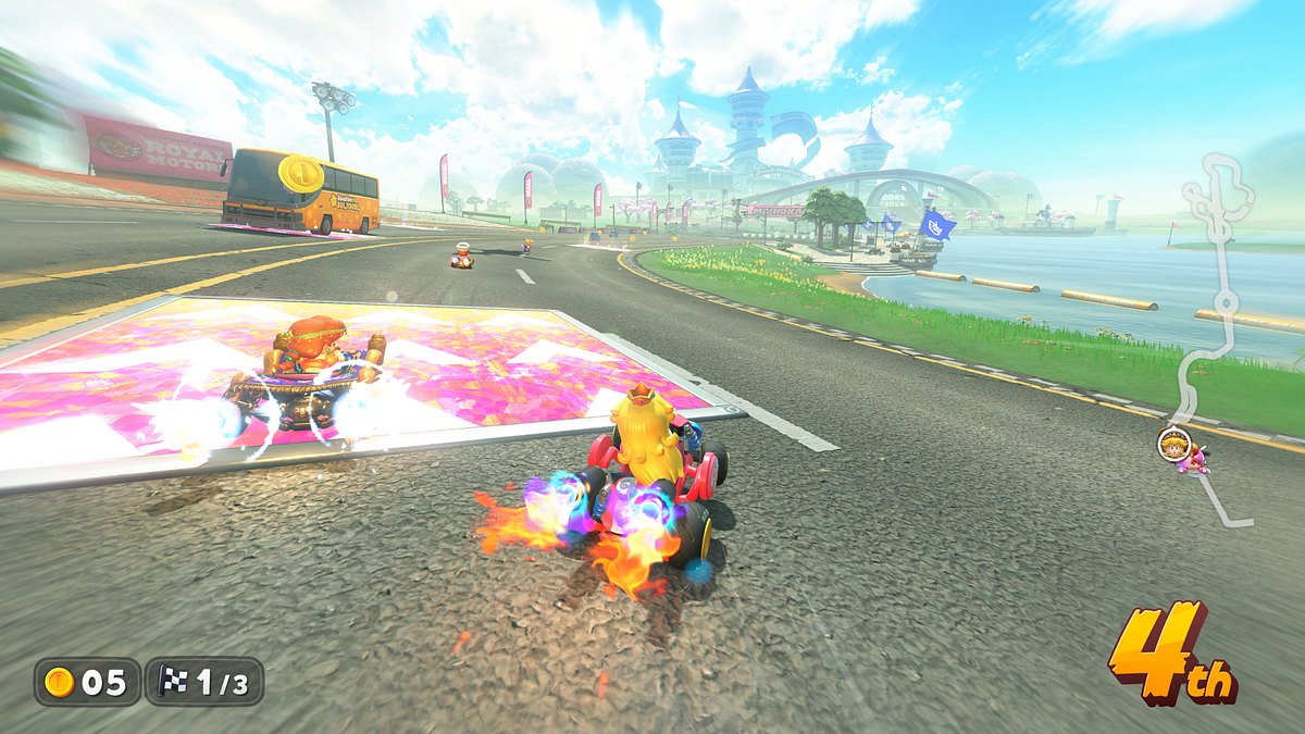 Prinzessin Peach liegt auf dem 4. Platz und rast im Grand Prix Modus von Mario Kart World um die Wette