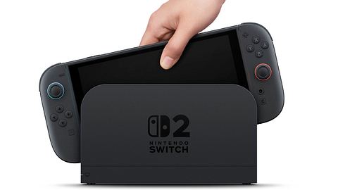 Auf dem Bild sieht man eine Nintendo Switch 2. Der  Handheld wird gerade in die Docking-Station gesteckt - Foto: Nintendo 