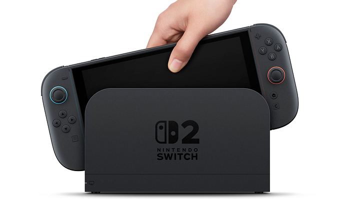 Auf dem Bild sieht man eine Nintendo Switch 2. Der  Handheld wird gerade in die Docking-Station gesteckt - Foto: Nintendo 