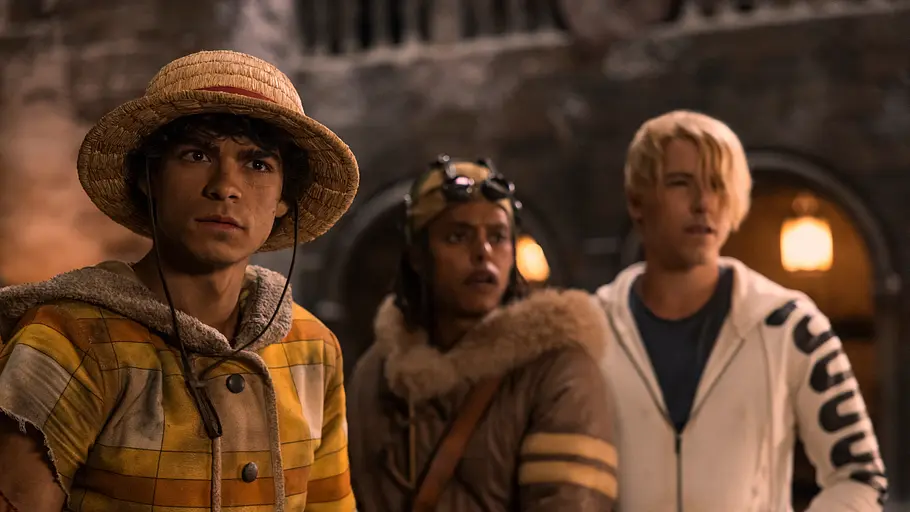 Luffy, Usopp und Sanji schauen überrascht und liecht verängstigt nach vorne.