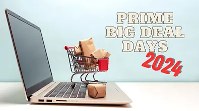 Laptop und Einkaufswagen teasern die Amazon Prime Big Deal Days im Oktober an - Foto: TVM