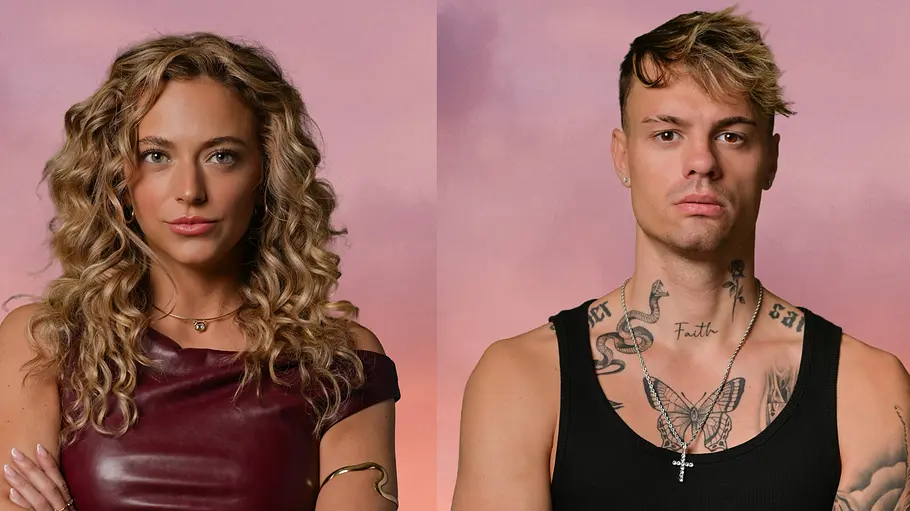 Tanina & Fabian Tanina & Fabian im Porträt vor rosa Hintergrund, beide stehen mit verschränkten Armen und blicken ernst in die Kamera.