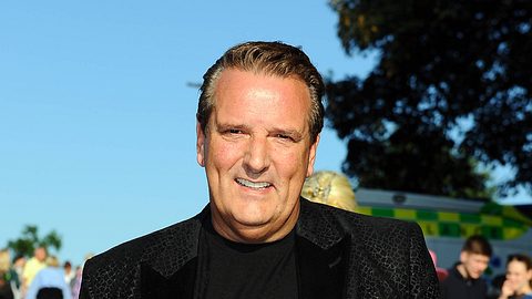 Ralf Dümmel lächelt. - Foto: IMAGO / Michael Wigglesworth