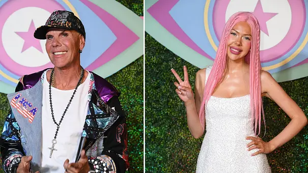 René Redo mit Kappe und bunter Jacke und Nina Bridney mit langen rosa Haaren im weißen Kleid und Victory-Zeichen. - Foto: Imago/Gartner René Redo mit Kappe und bunter Jacke und Nina Bridney mit langen rosa Haaren im weißen Kleid und Victory-Zeichen. - Foto: Imago/Gartner