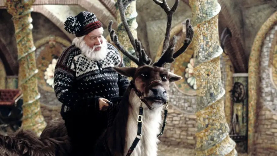 Der Weihnachtsmann und sein Rentier.