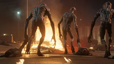 Demogorgons schleifen in einer Szene von Stranger Thing, Staffel 5, Folge 4 Kinder über den Boden. - Foto: Netflix