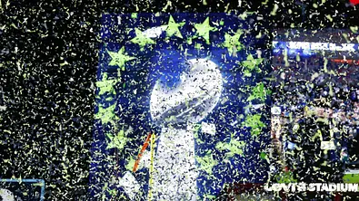 Die Trophäe des Super Bowl ist hinter einer Wand aus Konfetti zu sehen. Beim Super Bowl LX setzen sich die Seattle Seahawks gegen die New England Patriots durch. - Foto: IMAGO / EPA
