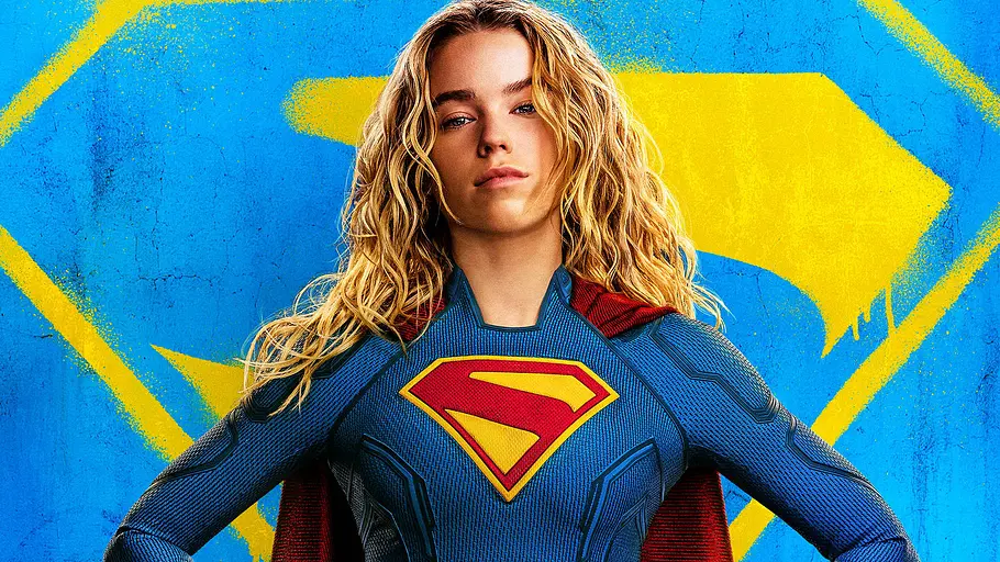 Supergirl Supergirl steht vor einer blau-gelben Version ihres eigenen Logos.