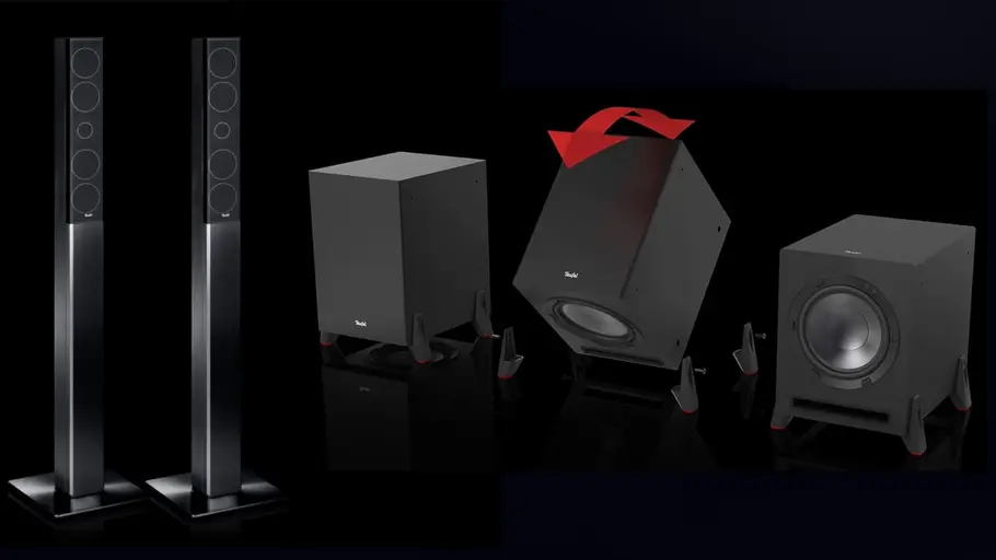 Teufel LT 4 5.1-Set L Subwoofer Top-Down-Funktion und zwei Lautsprechersäulen nebeneinander, alles vor einem schwarzen Hingergrund