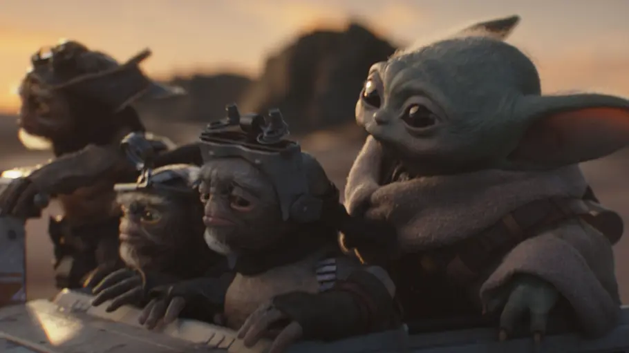 The Mandalorian and Grogu Grogu sitzt mit vier Anzellanern in einem Vehikel.