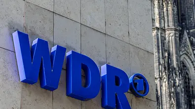 Man sieht das Logo des WDR. - Foto: IMAGO / Marc John Man sieht das Logo des WDR. - Foto: IMAGO / Marc John